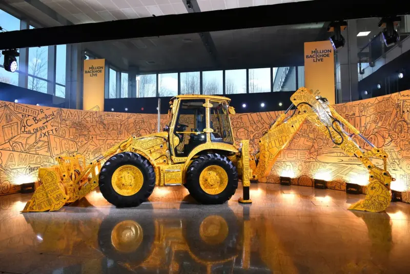 Miljons JCB universālo ekskavatoru